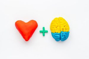 colourful clay heart, plus sign, and brain