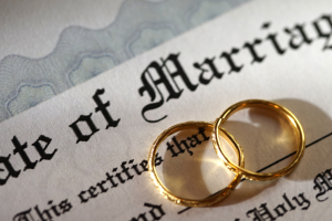 wedding rings and marriage certificate